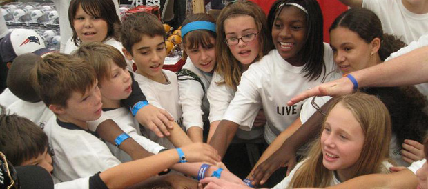 Group of kids in a huddle