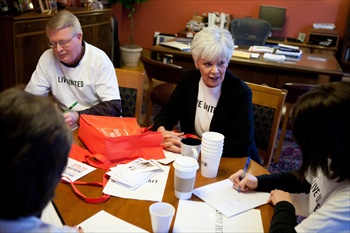 United Way volunteers around a table